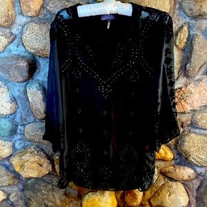 Never worn beautiful black blouse. Size small. Purchased from Sundance catalog